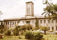 The colonial State Secretariat building and clock tower